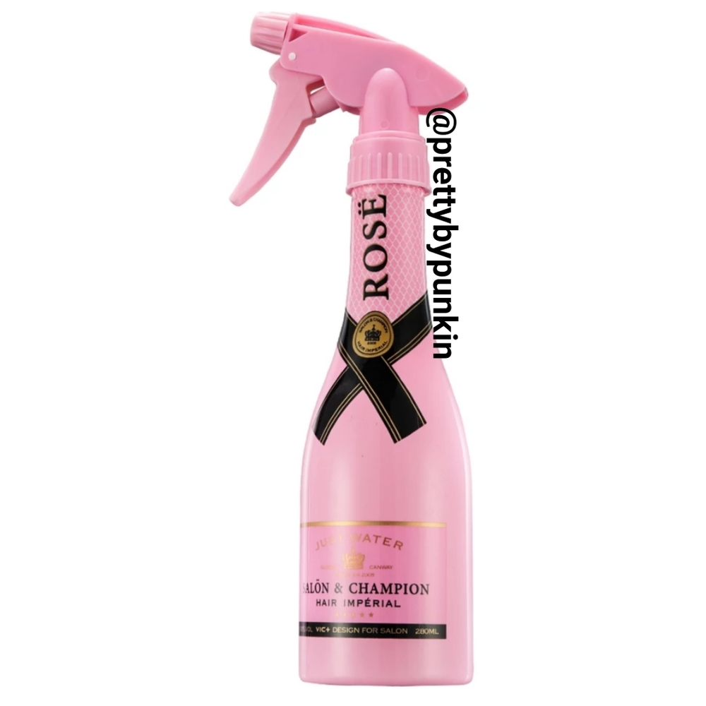 Pink spray bottle.